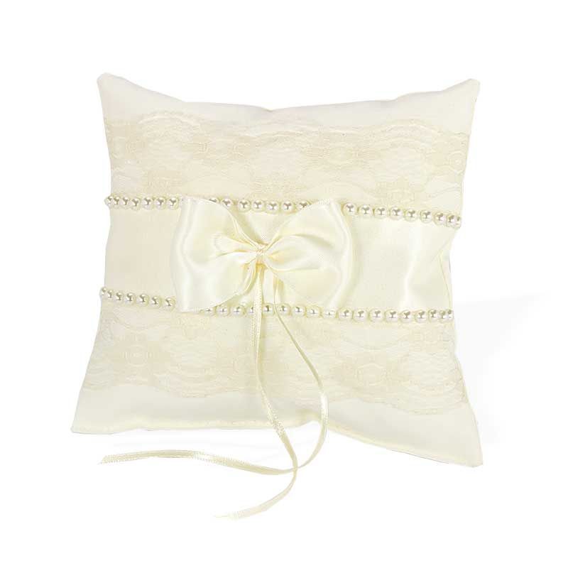Cojín  beige y perlas