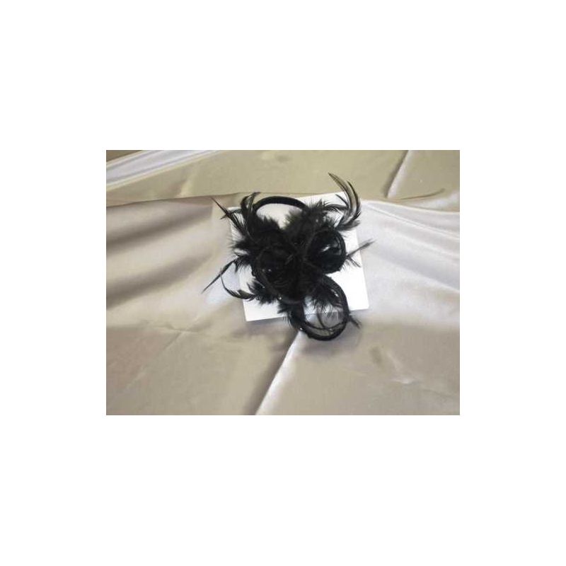 Tocado negro terciopelo y plumas