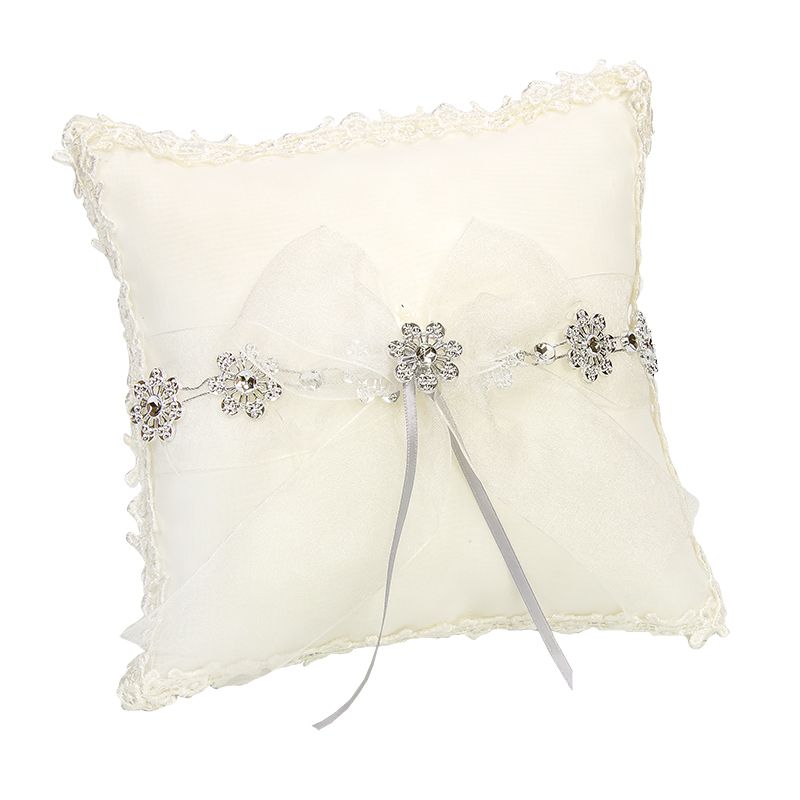 COJÍN FLORES PLATA Y LAZO ORGANZA       