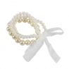 Pulsera triple de perlas con lazo blanco